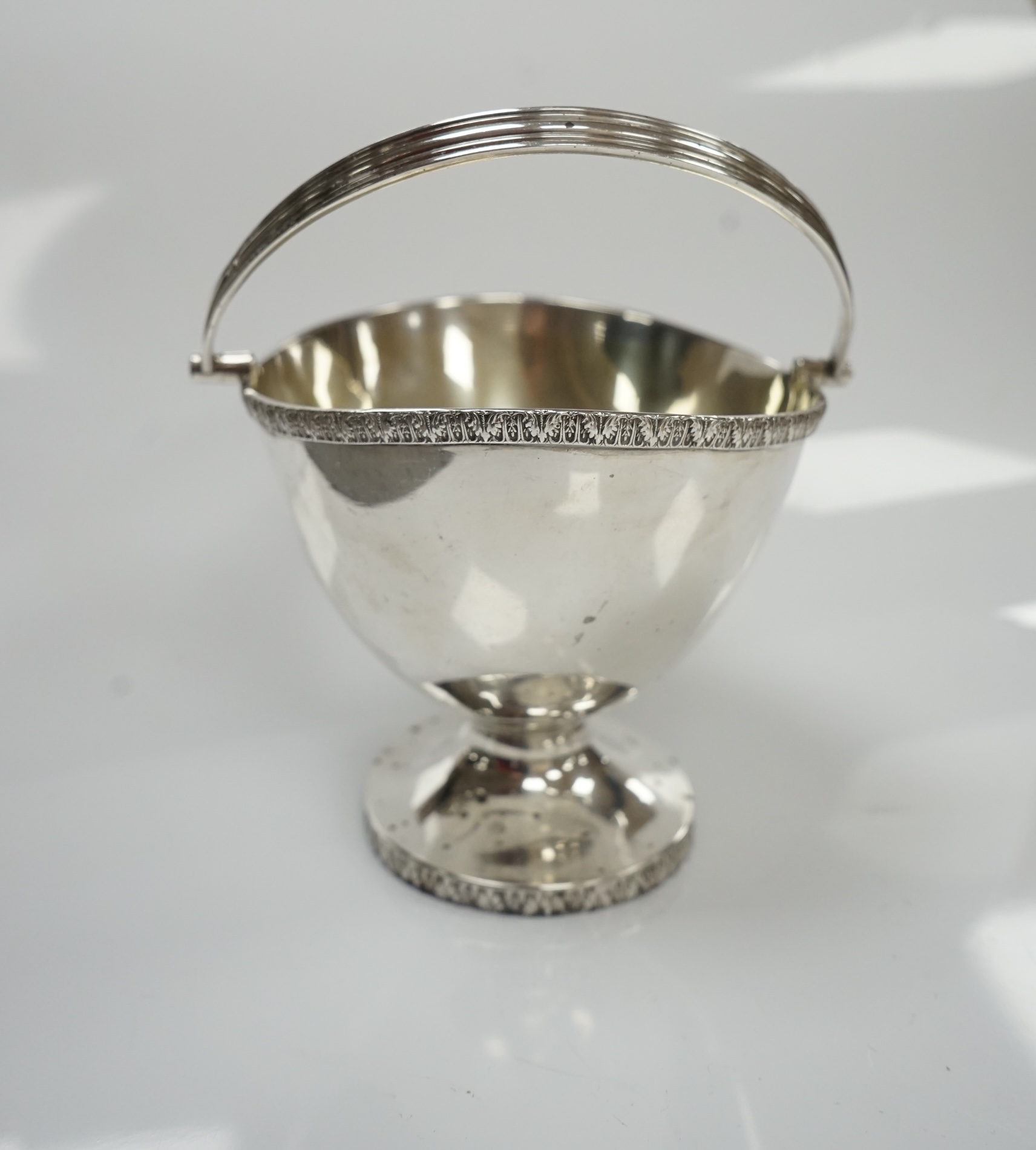 A George V silver oval sugar basket, Mappin & Webb, Birmingham, 1912, length 12.5cm, 6.2oz. Condition - fair